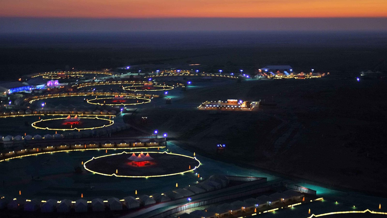 Aerial view of Rann Utsav Tent City, Dhordo lit up at dusk